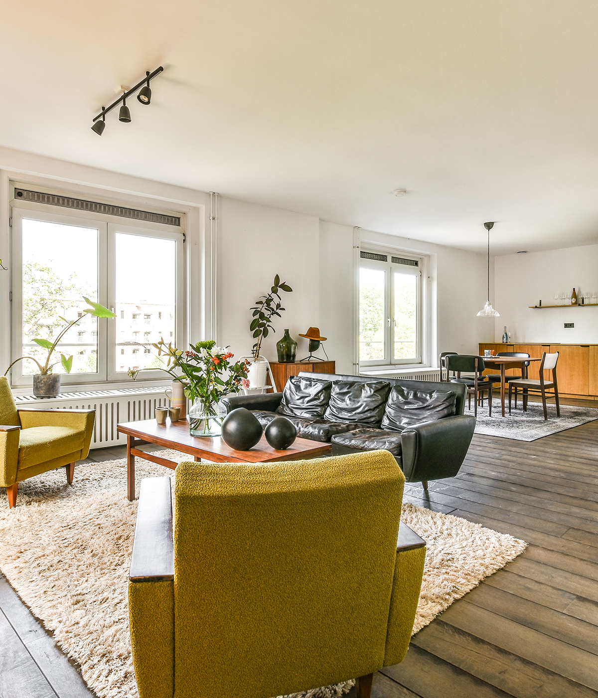http://Living%20hall%20with%20seating%20and%20dining%20area%20in%20a%20renovated%20Queens%20residence%20by%20MCG%20Corp.